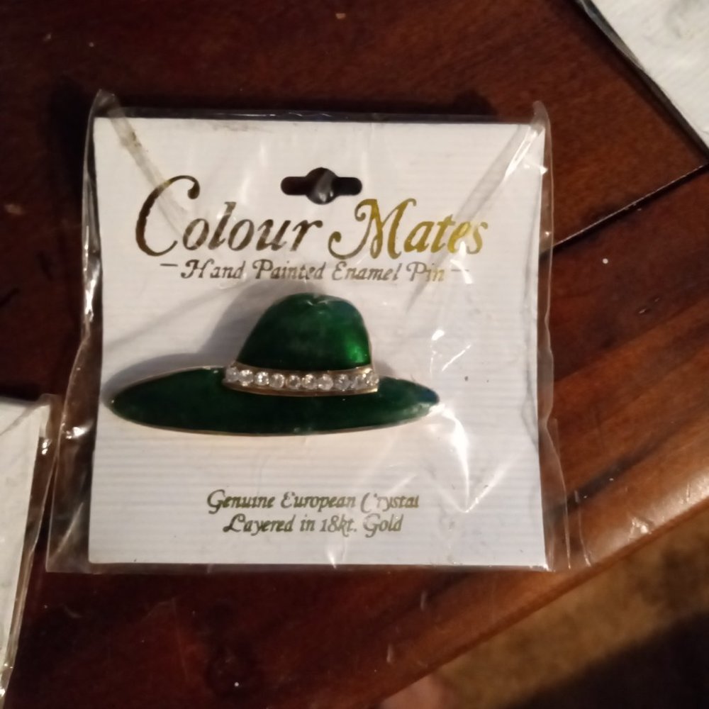Colour mates hand crafted enamel pin layered in 18k gold